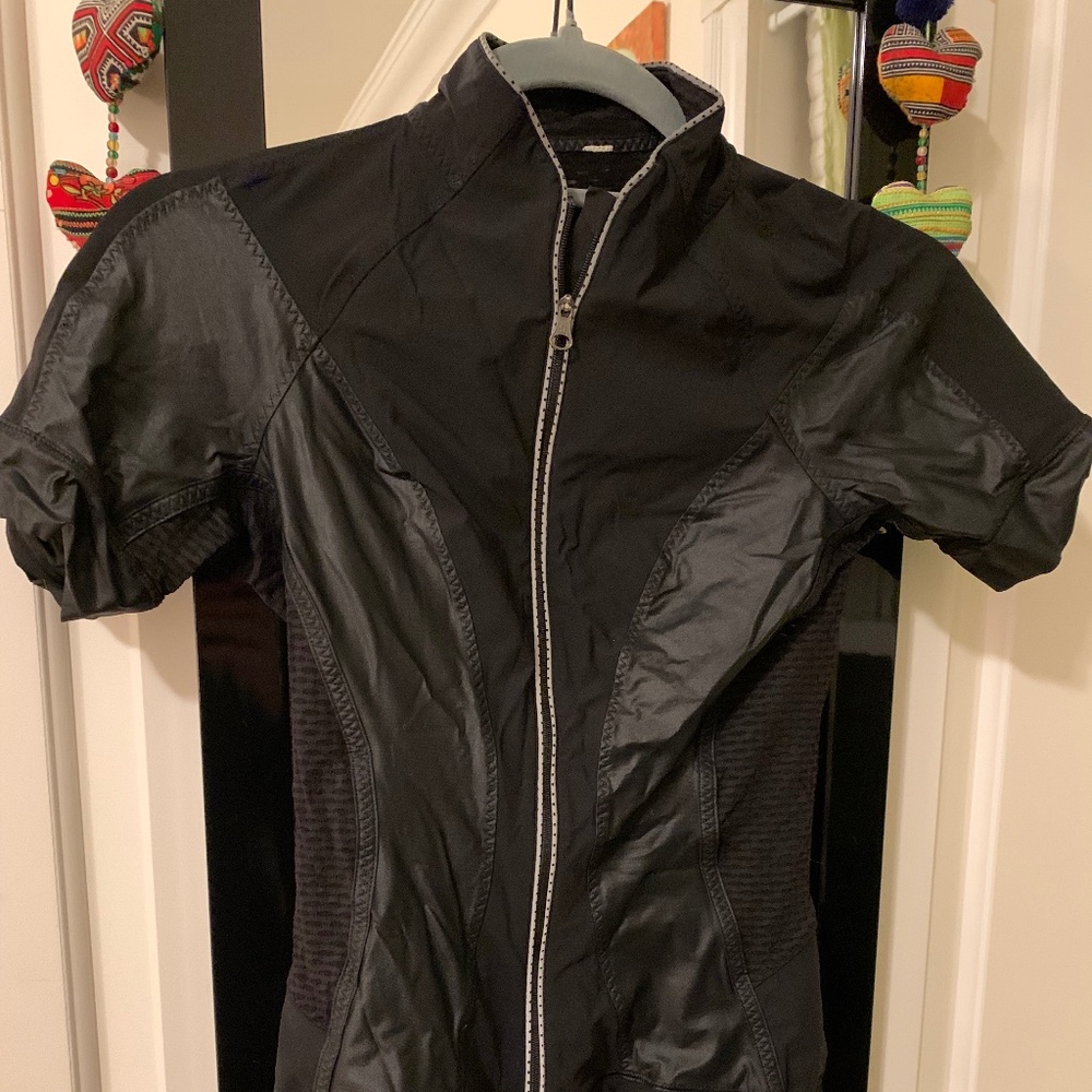 Lululemon short sleeve cycling jersey small/4 good used condition reflective
